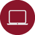 A circular maroon icon featuring a simple white outline illustration of a laptop computer with an open screen and keyboard. 