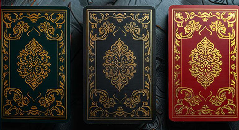 Luxury playing cards with gold foil ornate decorative patterns on coloured backgrounds premium printing