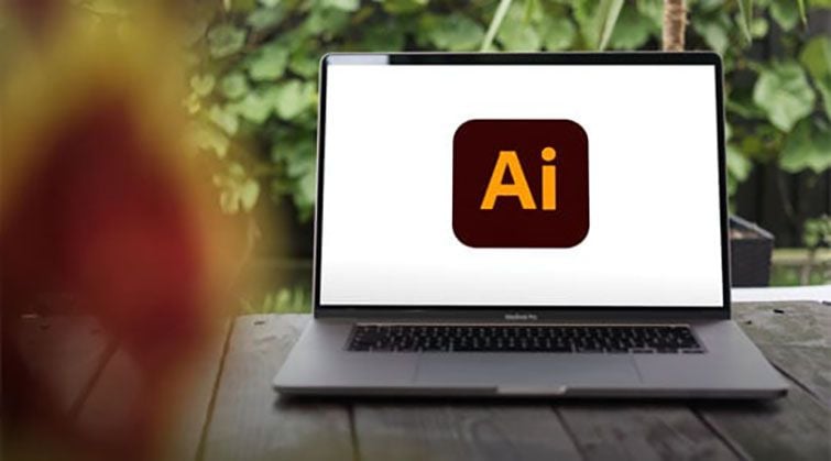 Adobe Illustrator AI logo on MacBook for professional vector graphics and design work