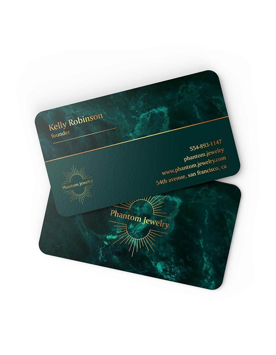Luxury jewellery business card with dark marble texture and premium gold accents