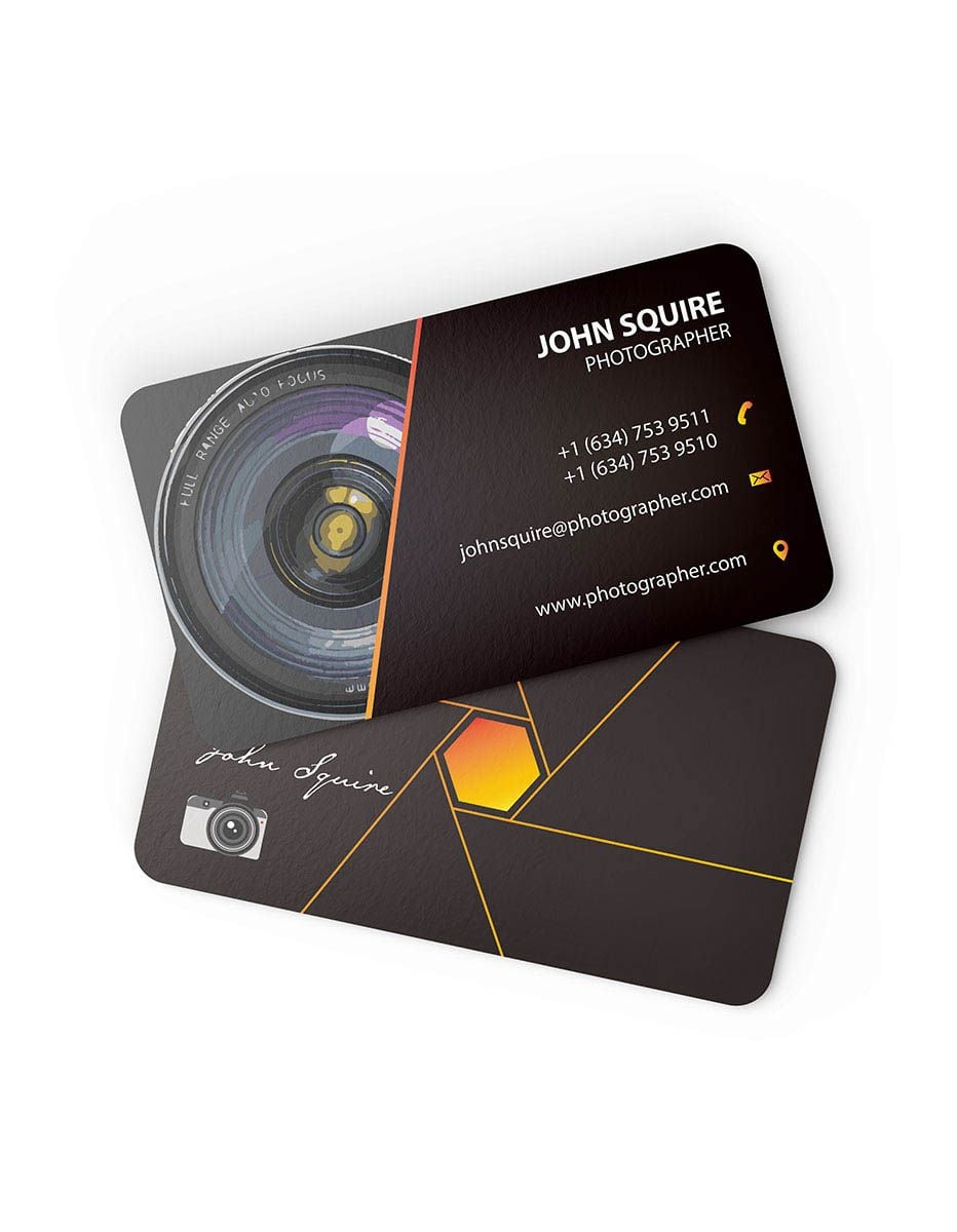 Modern photographer business card with camera lens artwork and sleek dark geometric styling