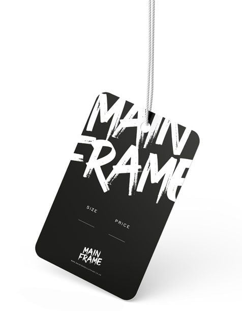 Clothing tag angled - Modern black clothing tag with bold white brush-style text reading main frame, featuring sections for size and brand details, attached with a white string on a clean white background.