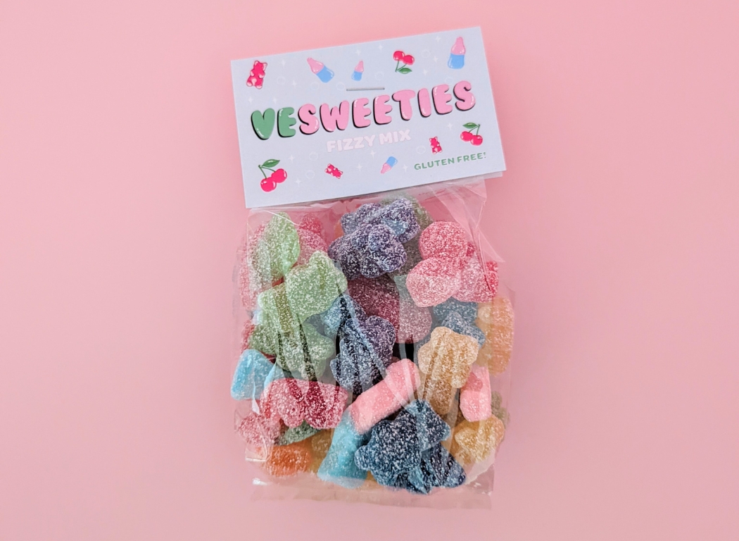 Vesweeties bag of fizzy mix on a pink background