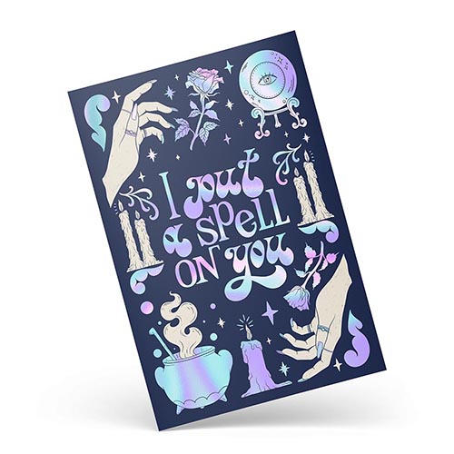 Witchy art print featuring the text "I Put a Spell on You" in thick holographic foil with spooky symbols on a dark blue background.