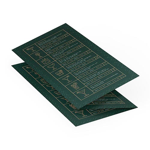 Tri-fold printed bar menu in deep green with gold images, partially open to reveal the front and inside.