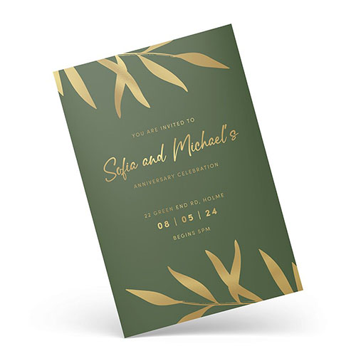 Botanical green anniversary invitation featuring gold foil text and leaf designs.