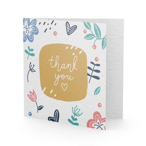 A beautifully designed thank you card printed on a textured paper stock 